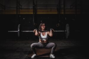 woman squat gym training